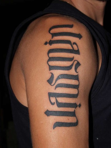 Bold Ambigram Tattoo On Shoulder