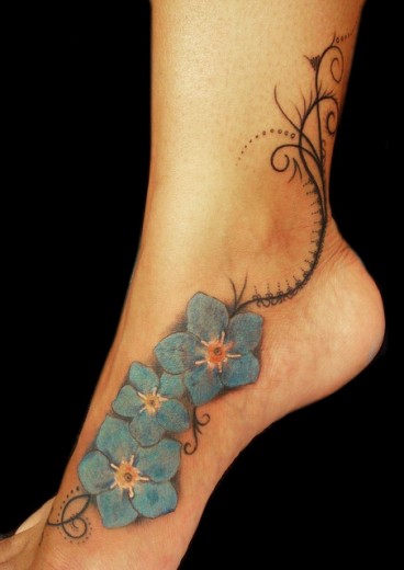 Blue Flowers Tattoo On Foot