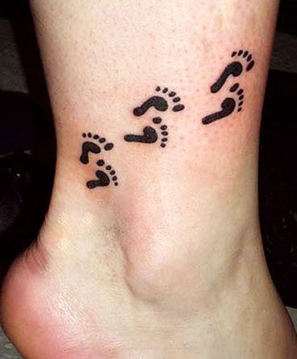 Footprints Tattoo On Leg