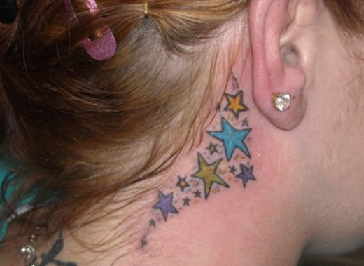 Colorful Stars Tattoo Behind Ear