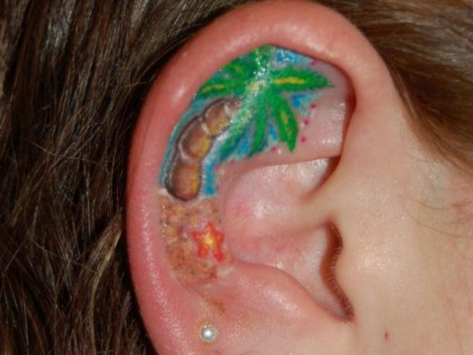 Small Tree Tattoo On Ear