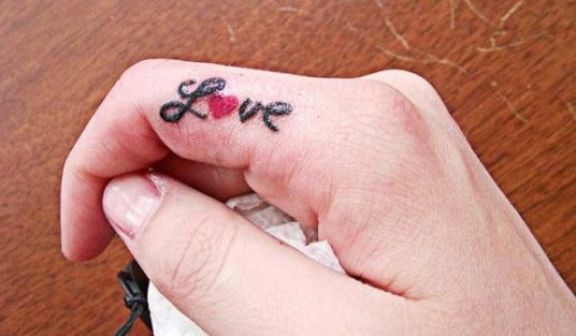 Love Tattoo On Finger