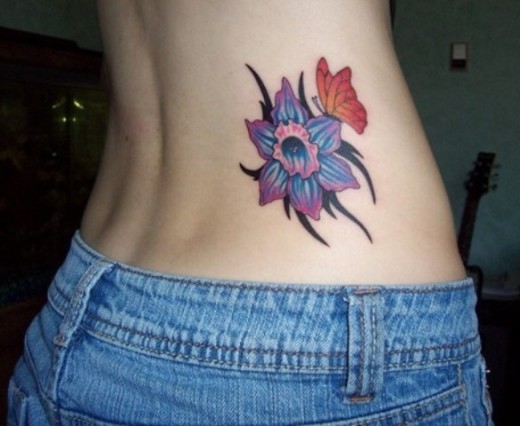 Nice Flower Tattoo On Waist