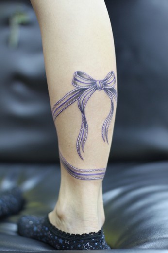 Bow Tattoo On Leg