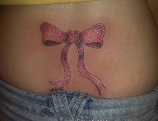 Bow Tattoo On Waist