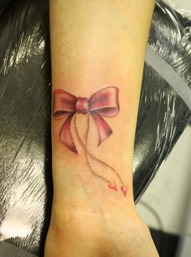 Bow Tattoo On Wrist