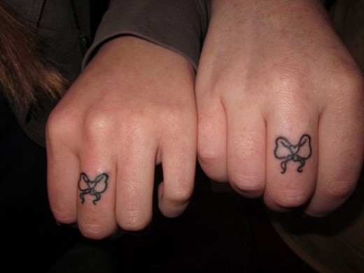 Bows Tattoo On Fingers