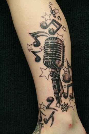 Mic & Notes Tattoo On Leg