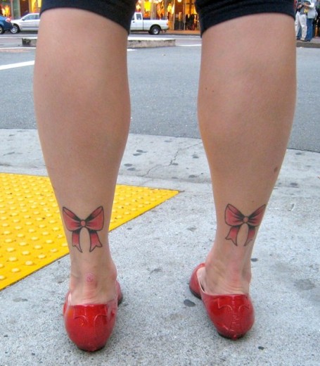 Red Bows Tattoo On Legs