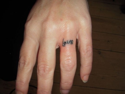 Love Tattoo On Finger