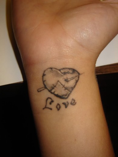 Love Tattoo On Wrist