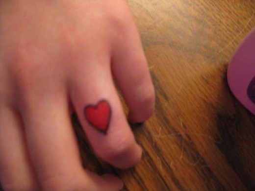 Red Heart Tattoo On Finger