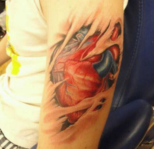 Ripped Heart Tattoo On Arm