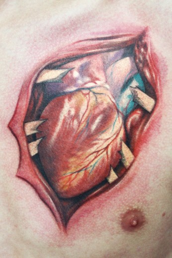 Ripped Heart Tattoo On Chest