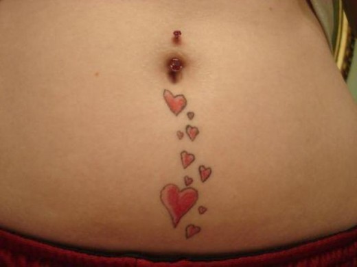 Small Hearts Tattoo On Belly