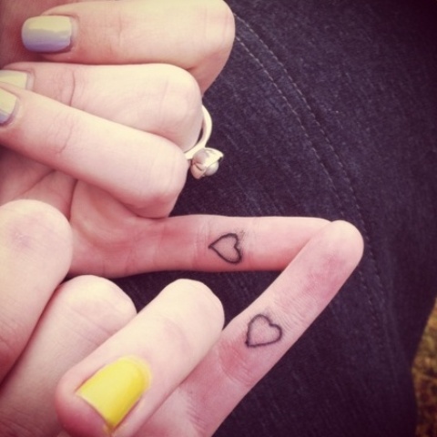 Small Hearts Tattoo On Fingers