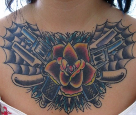 Guns Tattoo On Chest