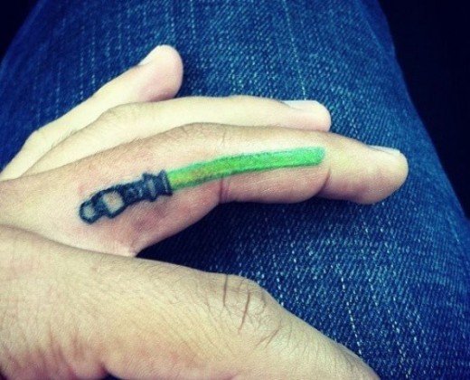 Lightsaber Tattoo On Finger