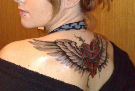 Nice Wings Tattoo On Back.