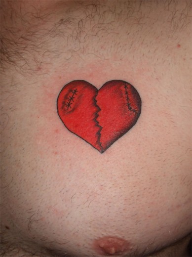 Red Broken Heart Tattoo On Chest