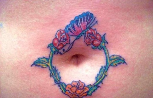 Small Flowers Tattoo On Belly