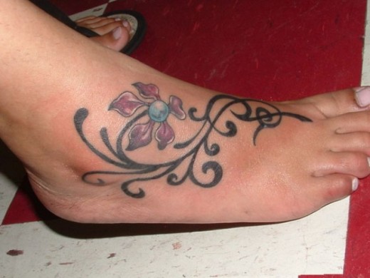 Tribal Flower Tattoo On Foot