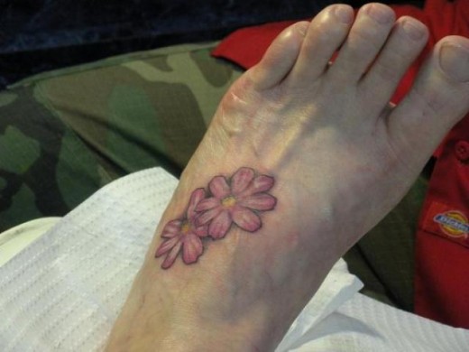 Two Flowers Tattoo On Foot