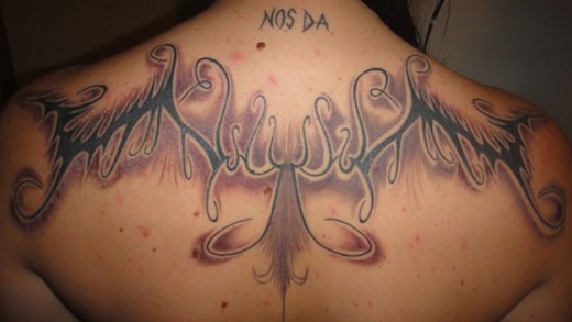 Unique Wings Tattoo On Back