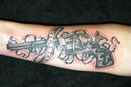 Veritas Gun Tattoo