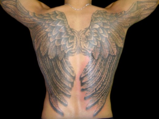 Wings Tattoo On Back.