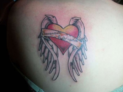 Memorable Heart Wings Tattoo