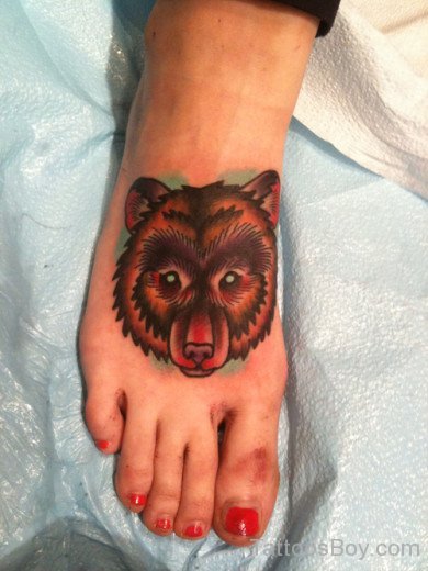 Bear Face Tattoo On Foot