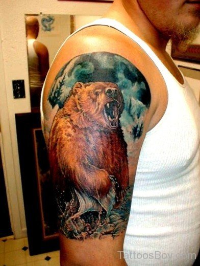 Bear In Sea Tattoo On Muscles