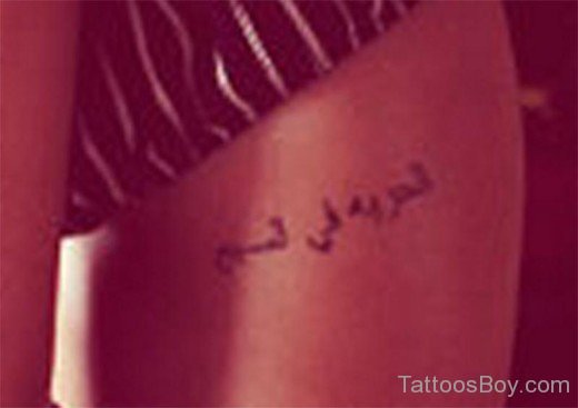 Funky Arabic Tattoo On Rib