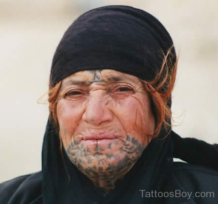 Nice Arabic Tatoo On Face