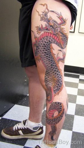 Awesome Colored Dragon Tattoo Design On Leg