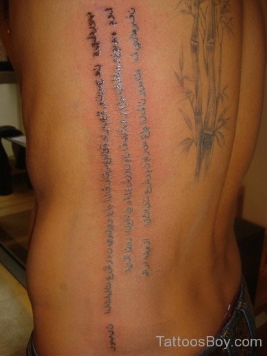Awesome Arabic Tattoo On Back Side Rib
