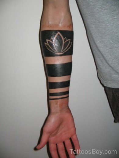 Black Ink Flower Tattoo On Arm