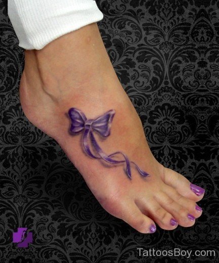 Blue Bow Tattoo On Ankle 