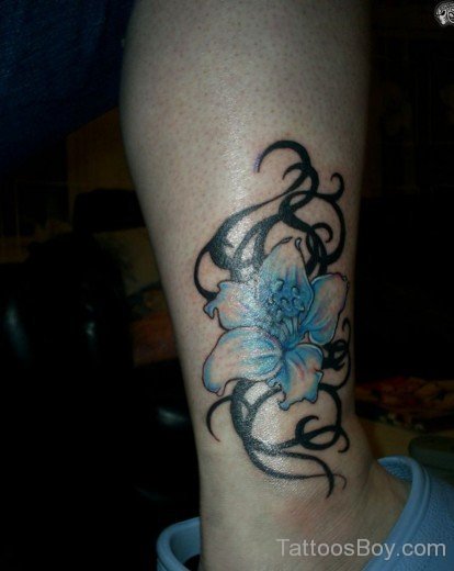 Blue Flower Tattoo On Ankle 