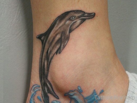 Beautiful Dolphin Fish Tattoo On Ankle  