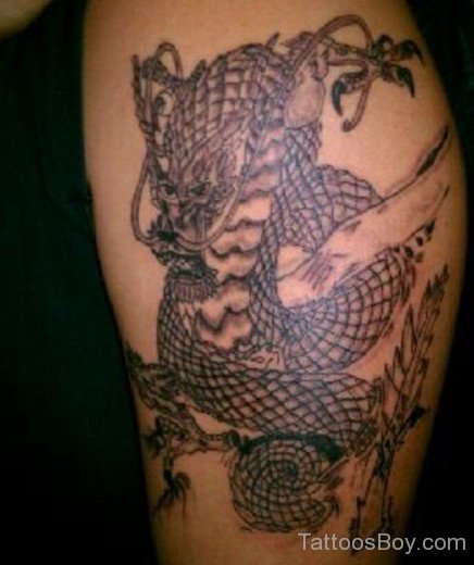 Awful Dragon Tattoo On Arm And Shoulder