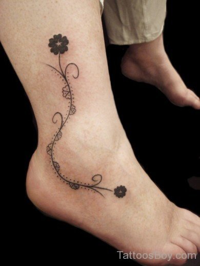 Awesome Flower Chain Ankle Tattoo