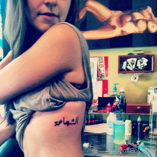 Girl Rib Side Arabic Tattoo