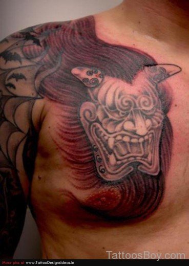 Horrible Devil  Mask Tattoo  On Chest