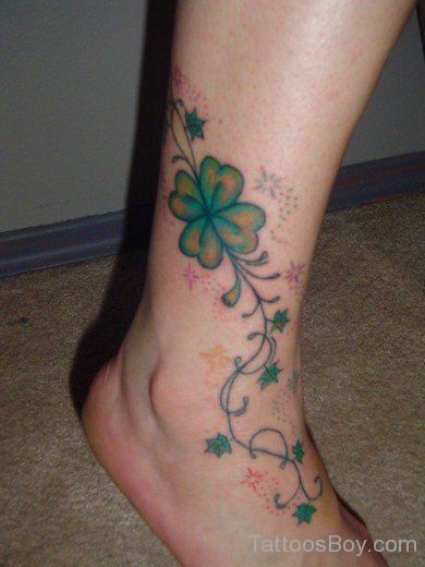 Fine Lilly Flower Tattoo On Ankle