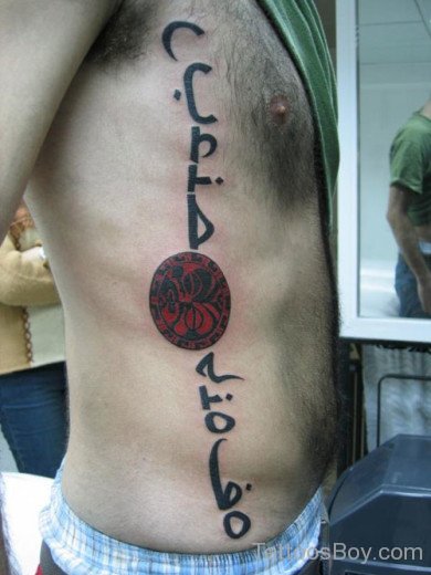 Long Arabic Tattoo On Side Rib