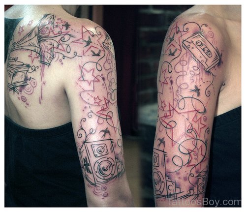Musical  Tattoos On Shoulder And Chest