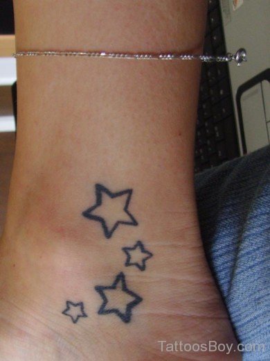 Fine  Star Tattoo On Ankle 