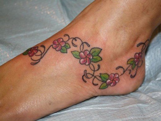 Lovely Flower Tattoo Design On Ankle 